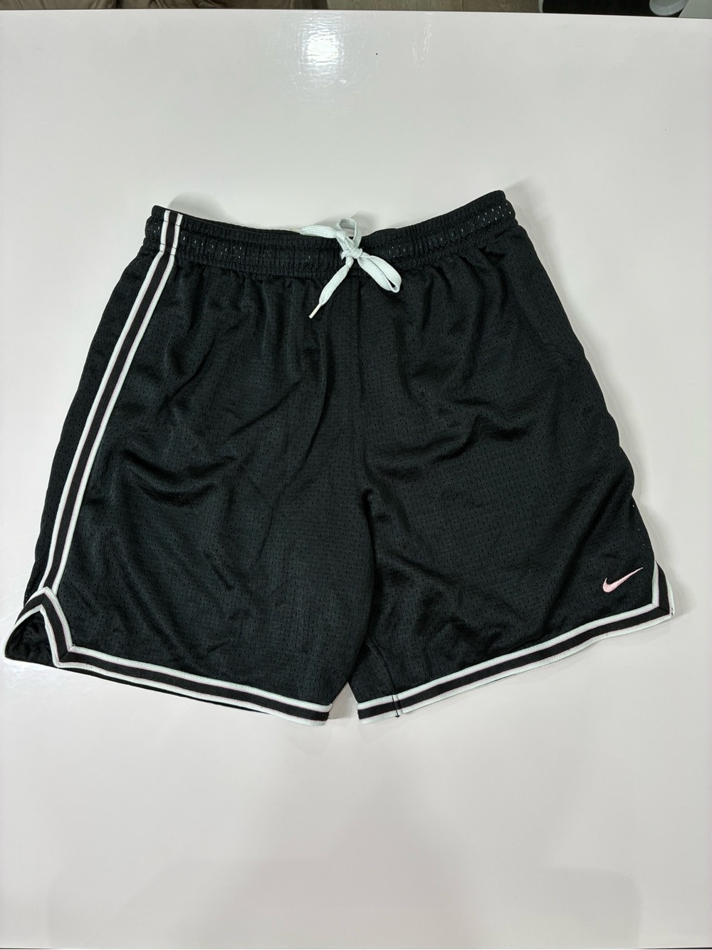 Nike Black Athletic Mesh Shorts with White Trim and Pink Swoosh